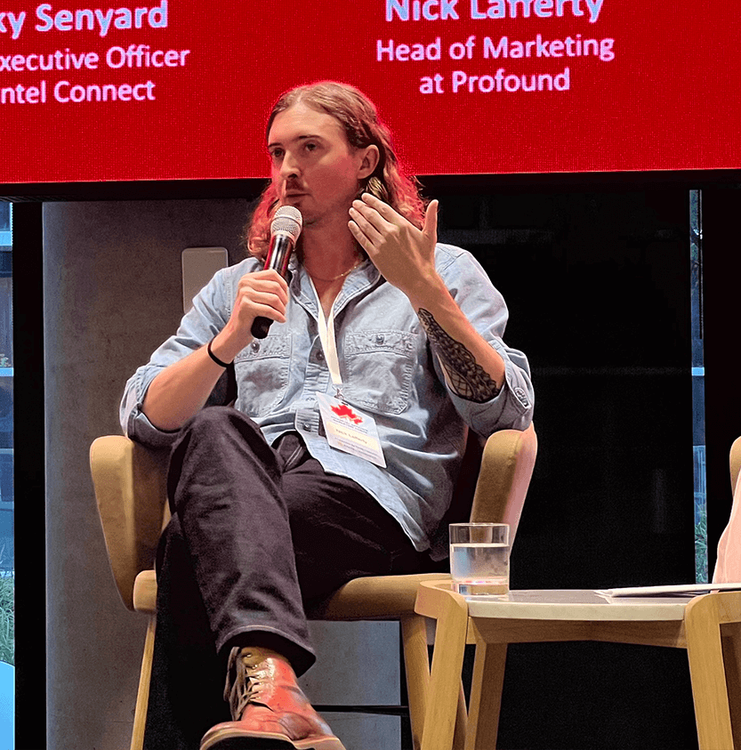 A shot from the back of the audience at a FAMF panel, all highly engaged with the talk